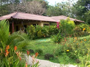 beautifully designed cabina midst tropical garden