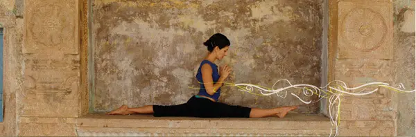 woman doing ashtanga yoga on concret base