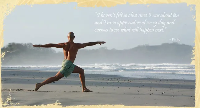 A participant is practicing warrior pose in Nosara Yoga Institute landing