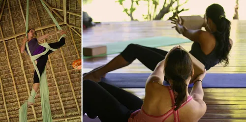 women practicing aerial yoga at wooden yoga deck