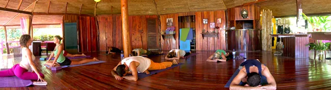 Participants are practicing Yoga