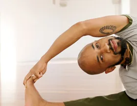Keith Borden is doing Janu shirasana