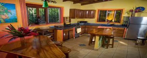 beautifully designed kitchen with wooden furniture