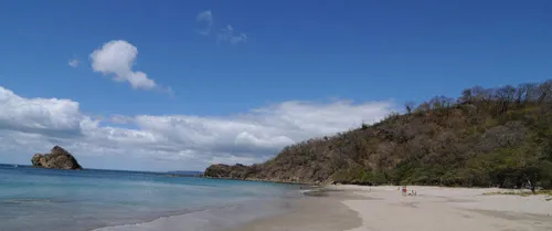 Beautiful Bahia Salinas sea beach under brilliant blue sky