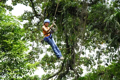 beautifull woman having fun at Arenal Ecoglide Park