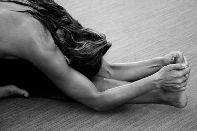 Nicole Loria doing intense streching