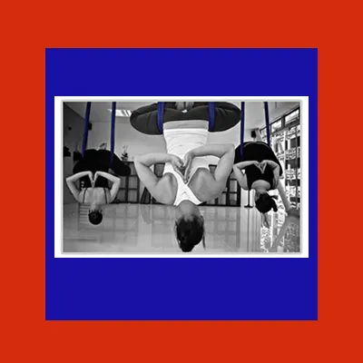 woman doing aerial yoga