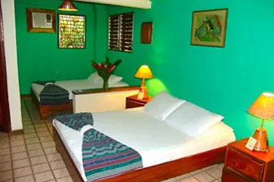 bed room with two queen size beds on coconut harry's