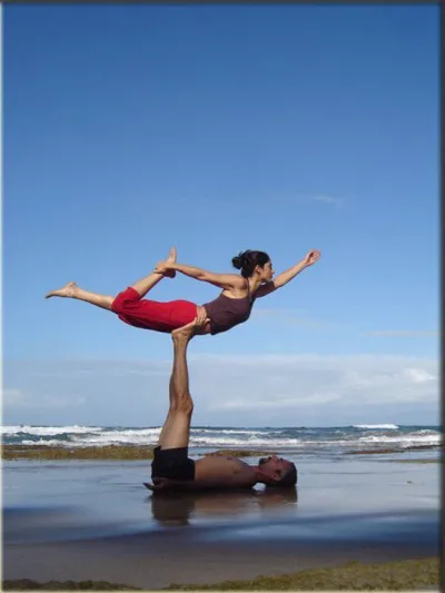 couple practicing practicing partner yoga at yoga mandir