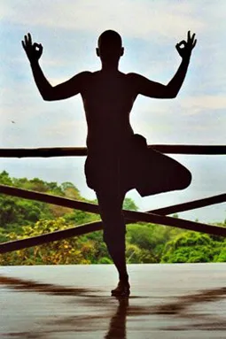 Man practicing tree pose