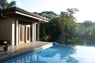 A beautiful front view of Pool side bungalow