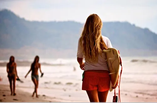 Woman with surfing board