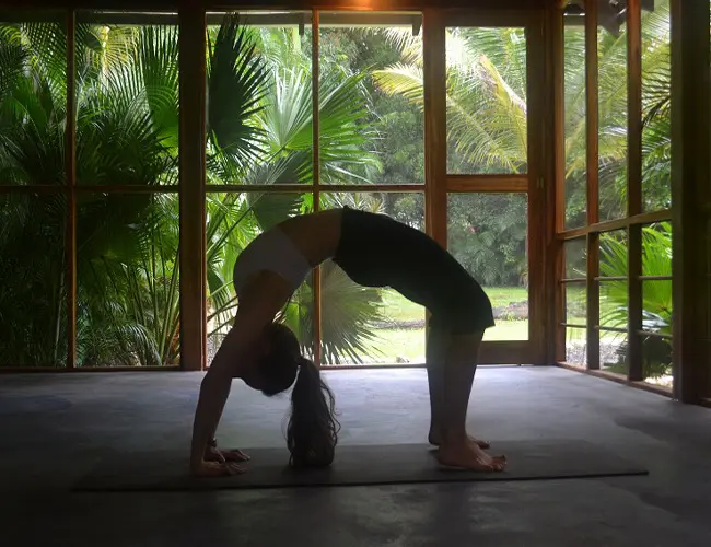 woman doing yoga at peace retreat