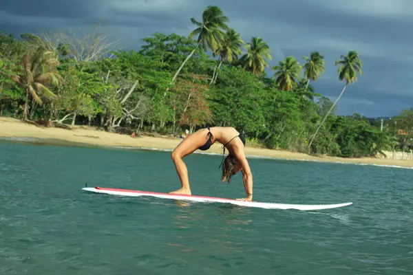 woman doing SUP yoga